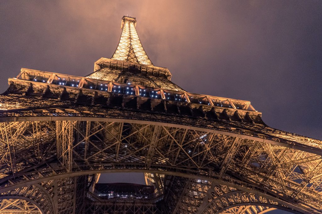 Eiffel Tower lighting up at night