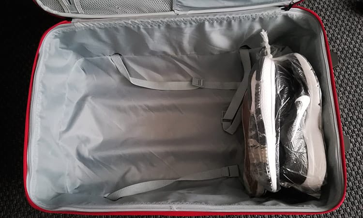shoes packed in luggage bottom