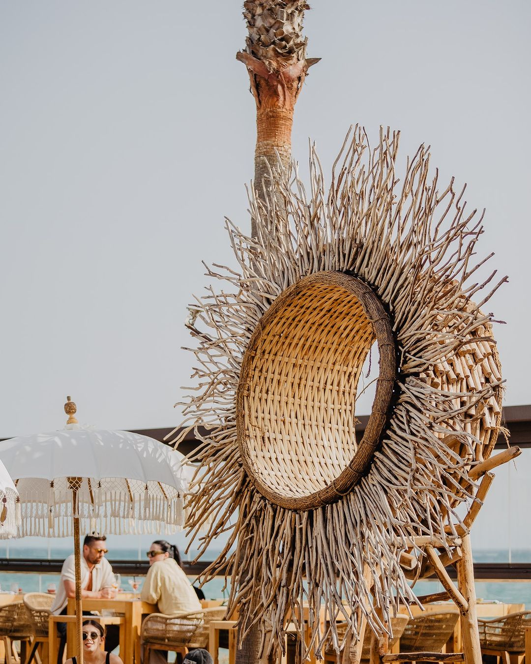 Iconic sun wicker at Well - Best Exotic Beach Clubs in Europe