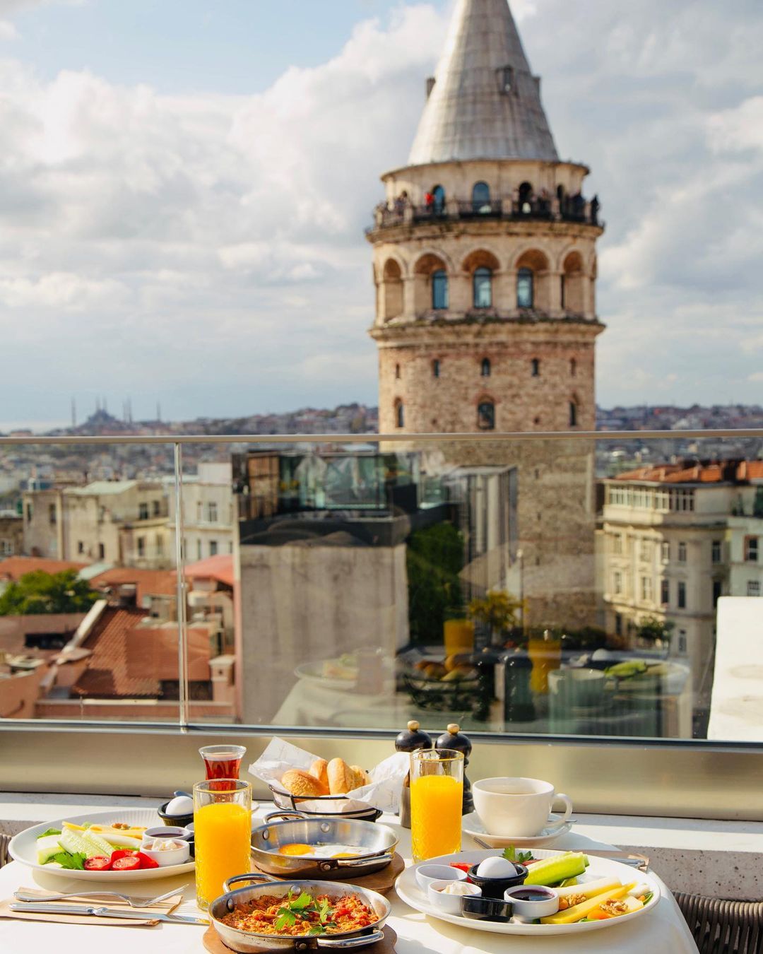 A delightful breakfast at Barnathan Roof with Galata Tower on the background - Best Restaurants with Bosphorus View