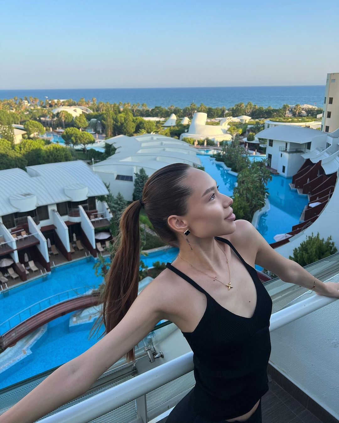 Beautiful girl on the balcony at Cornelia Diamond Golf Resort & Spa