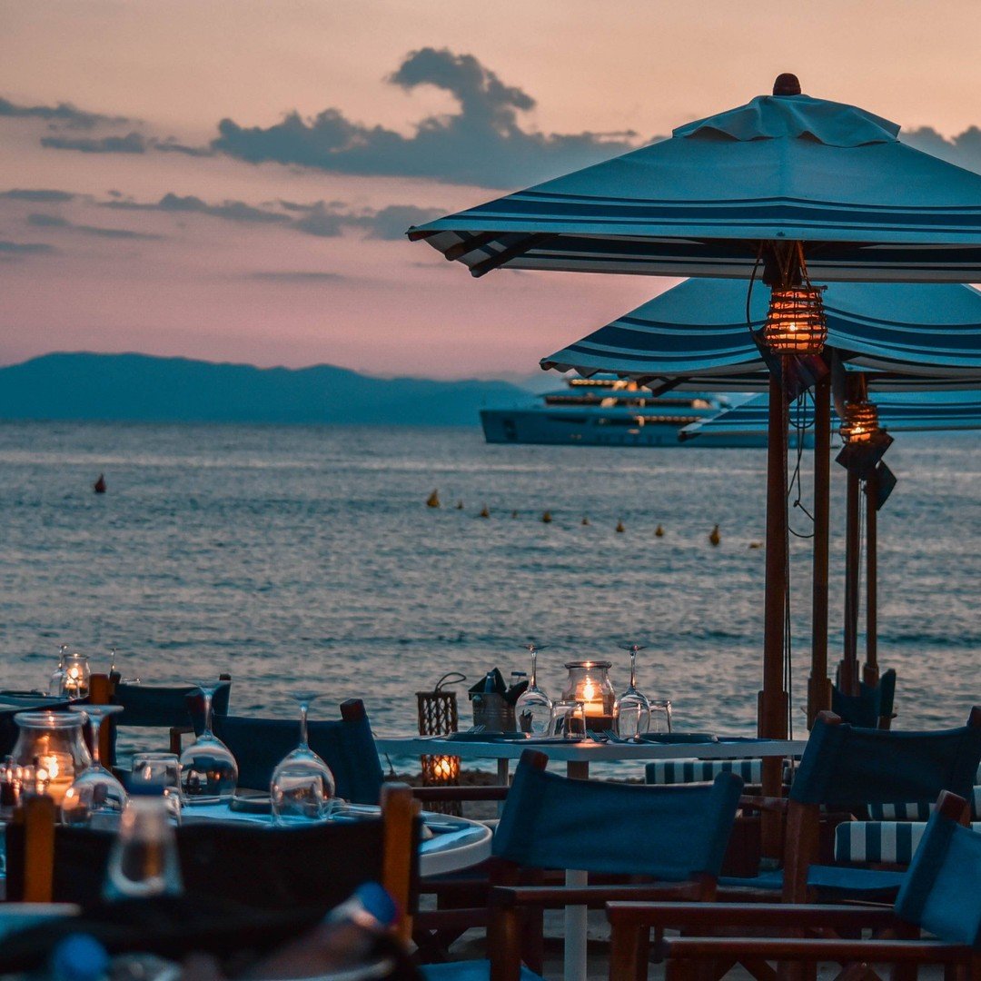 Enjoying Mediterranean Delicacies at the day-to-dusk beach-side dining tables of "40" at Astir Beach