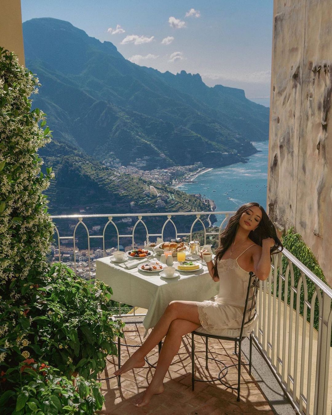 Starting off your day with an Italian breakfast overlooking the Amalfi Coast at Caruso - Best Infinity Pools in Europe