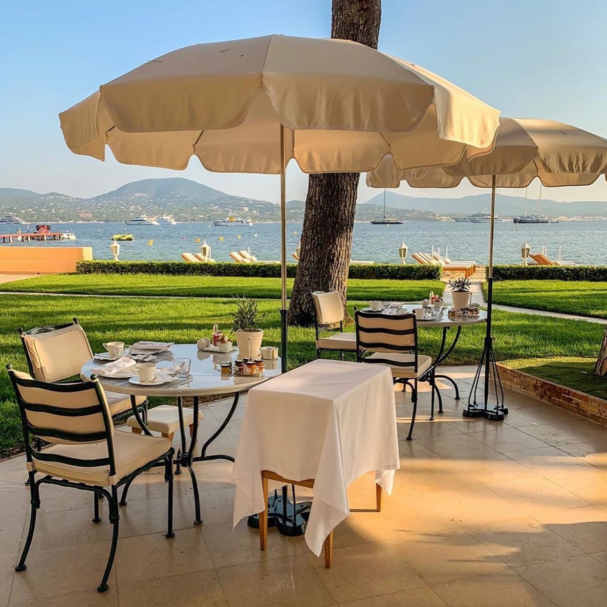 La Terrasse at the Cheval Blanc Hotel in St. Tropez presents a chic and sophisticated dining experience with stunning sea views