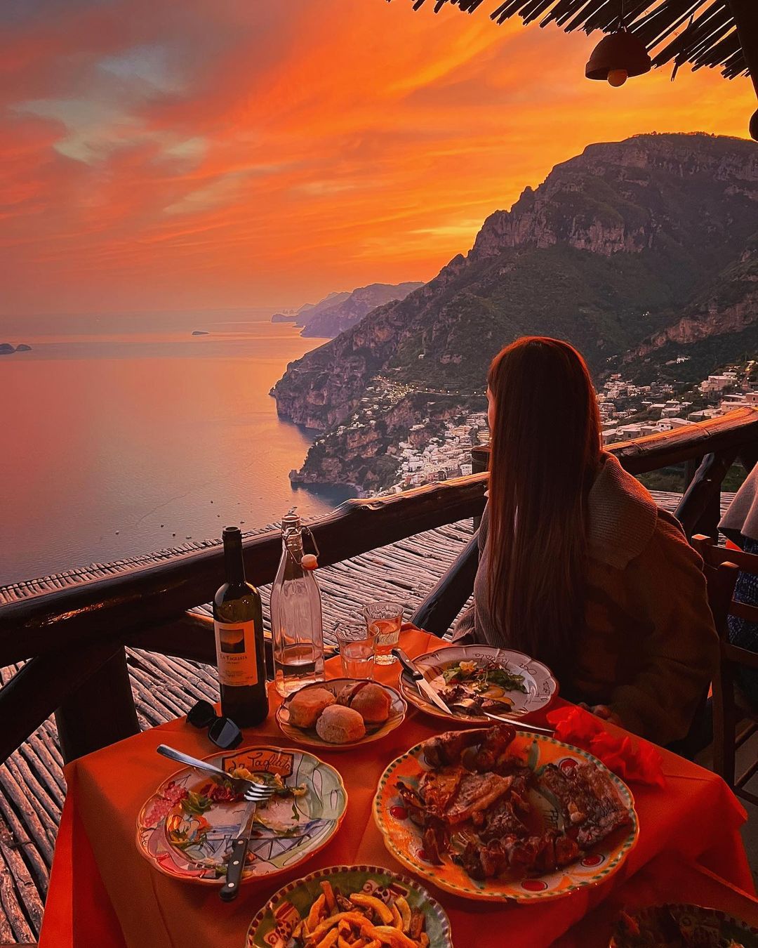 Incredible sunset hues in Positano at Trattoria La Tagliata - Best Outdoor Restaurants in Europe