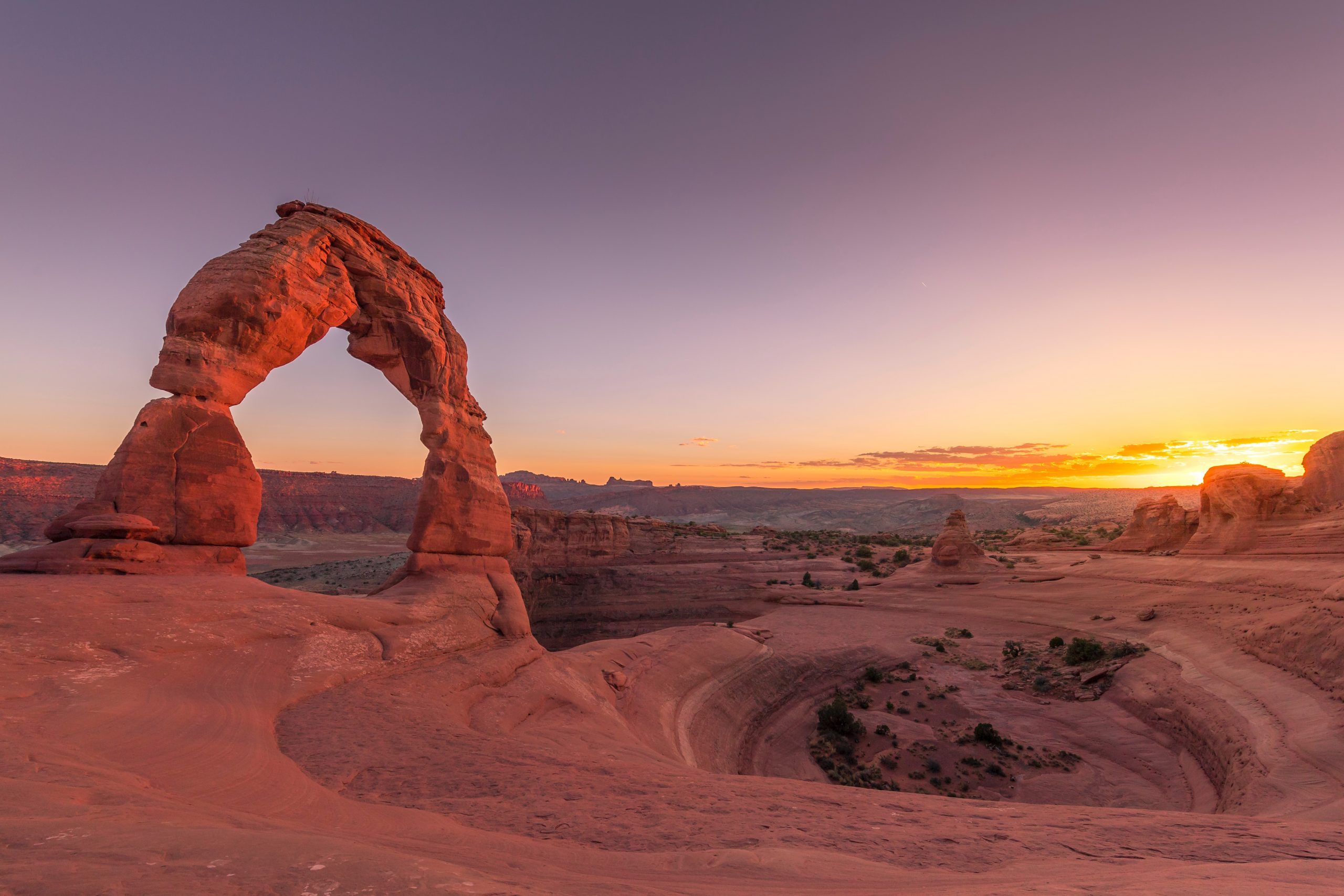 Sunrise at Delicate Arch Trail, Moab, UT, USA - - Best National Parks in America