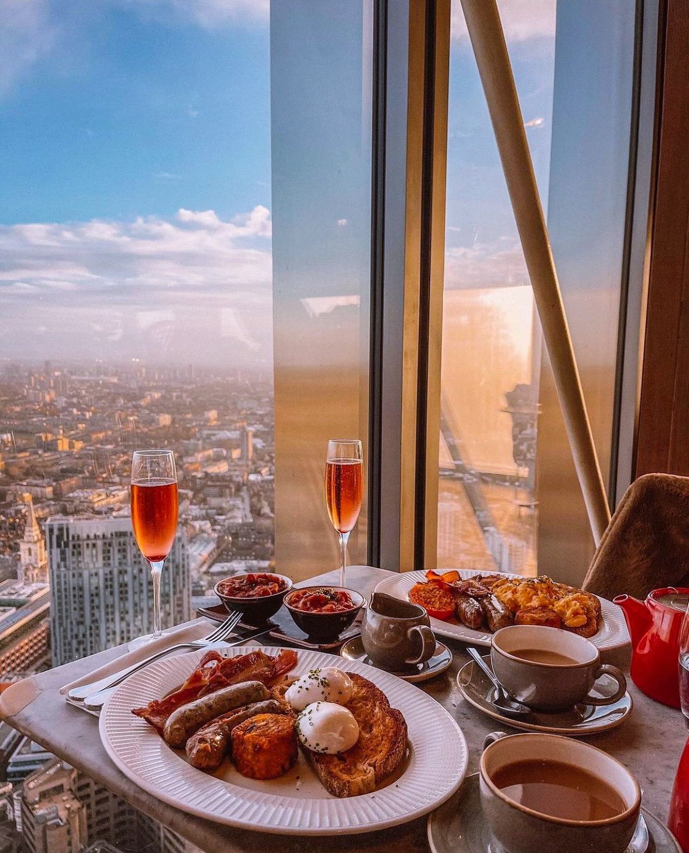 Warm sunset views - The ultimate dinner experience at at Duck & Waffle - Warm and Cozy Restaurants in London