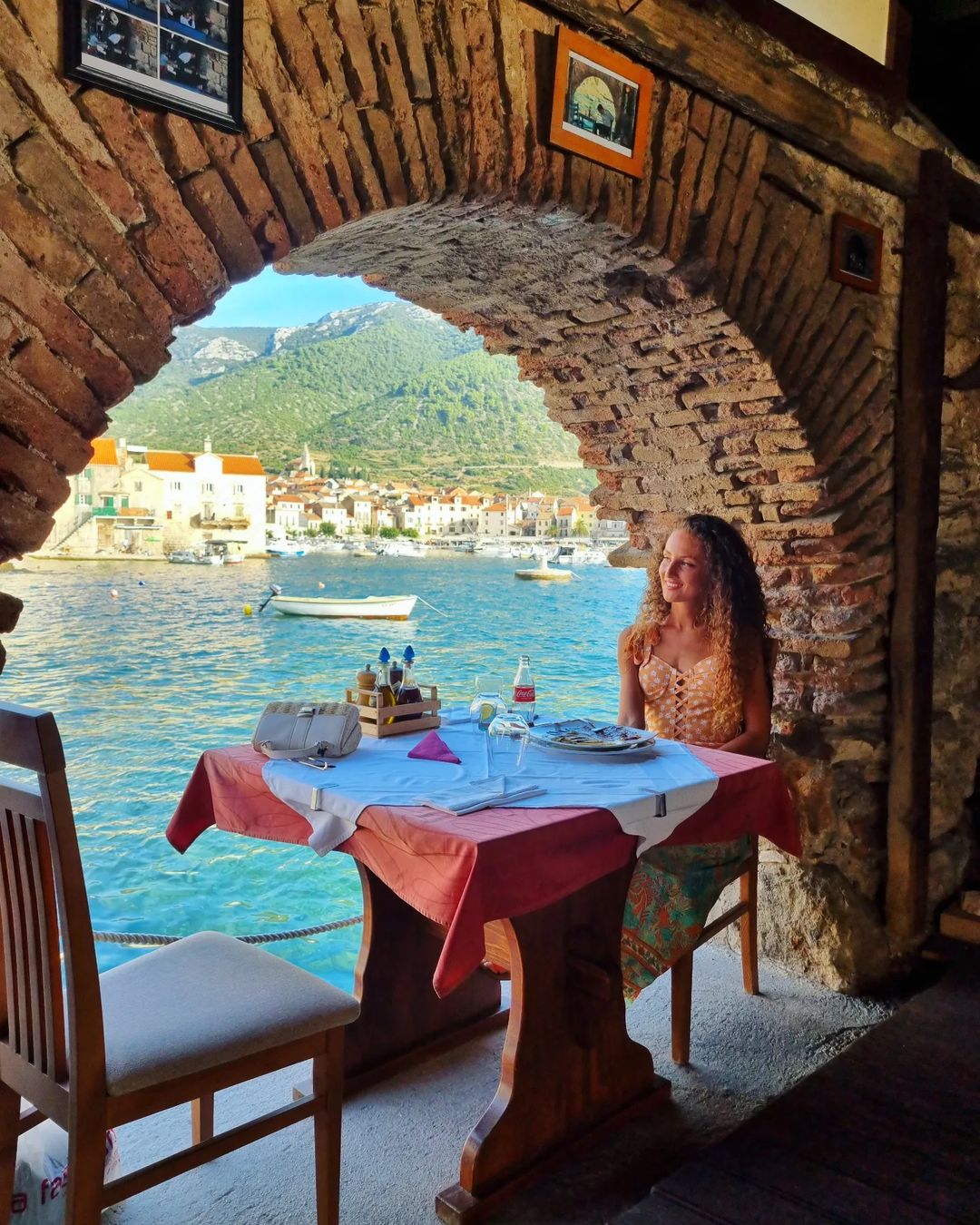 Views over the sea in the picturesque fishing village of Komiza - Best Outdoor Restaurants in Europe